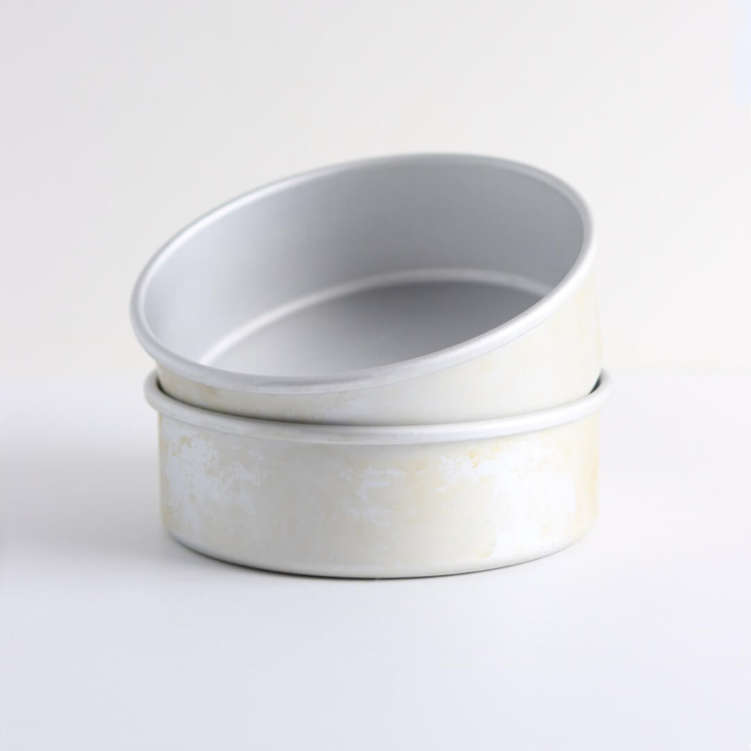 Two 6-inch cake pans sit on a white background.