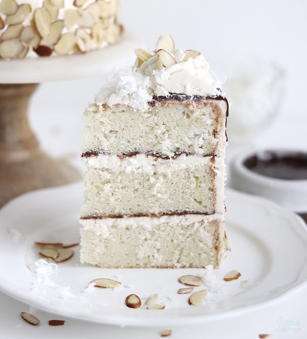 coconut cake with coconut buttercream and chocolate ganache