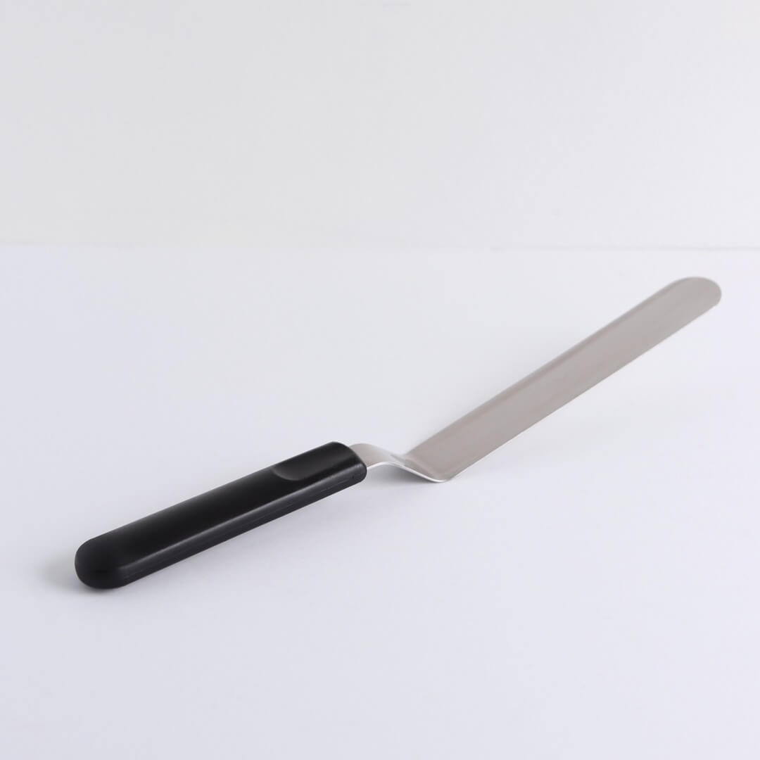 A 13-inch angled icing spatula sits on a white background.