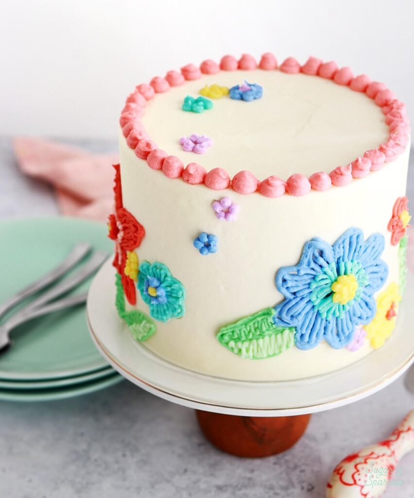 floral embroidery cake by sugar and sparrow