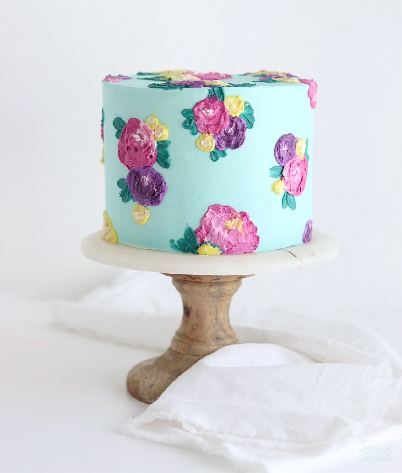 impressionist flowers cake by sugar and sparrow