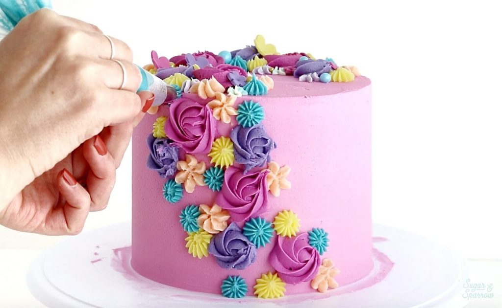 how to create a cascading floral cake with buttercream