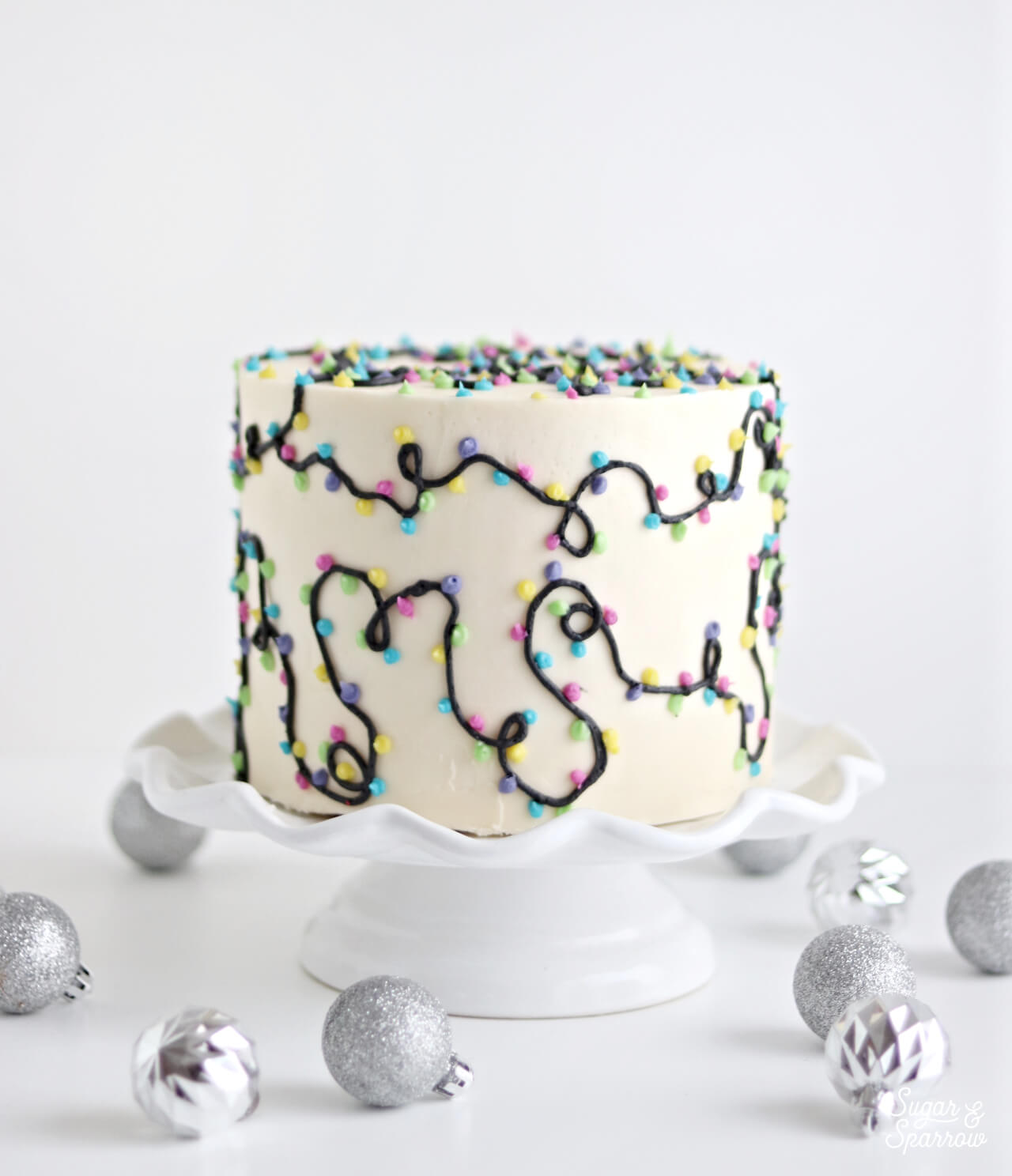 christmas lights cake tutorial by sugar and sparrow