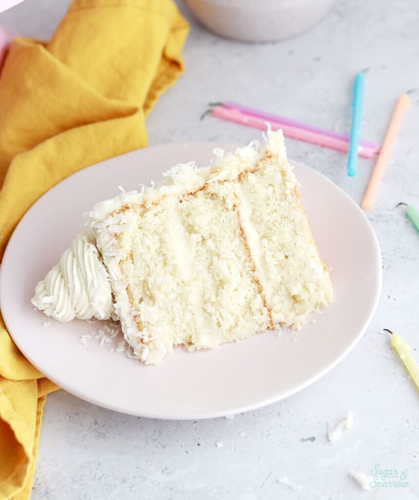 coconut cake with coconut cream cheese buttercream recipe by sugar and sparrow