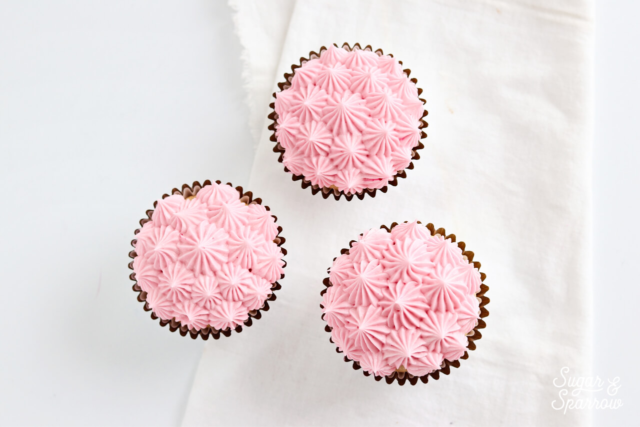 pink cupcakes by sugar and sparrow