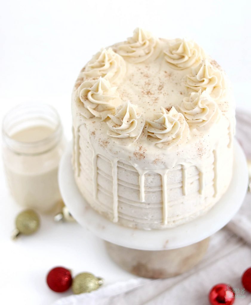 eggnog layer cake with eggnog ganache drip