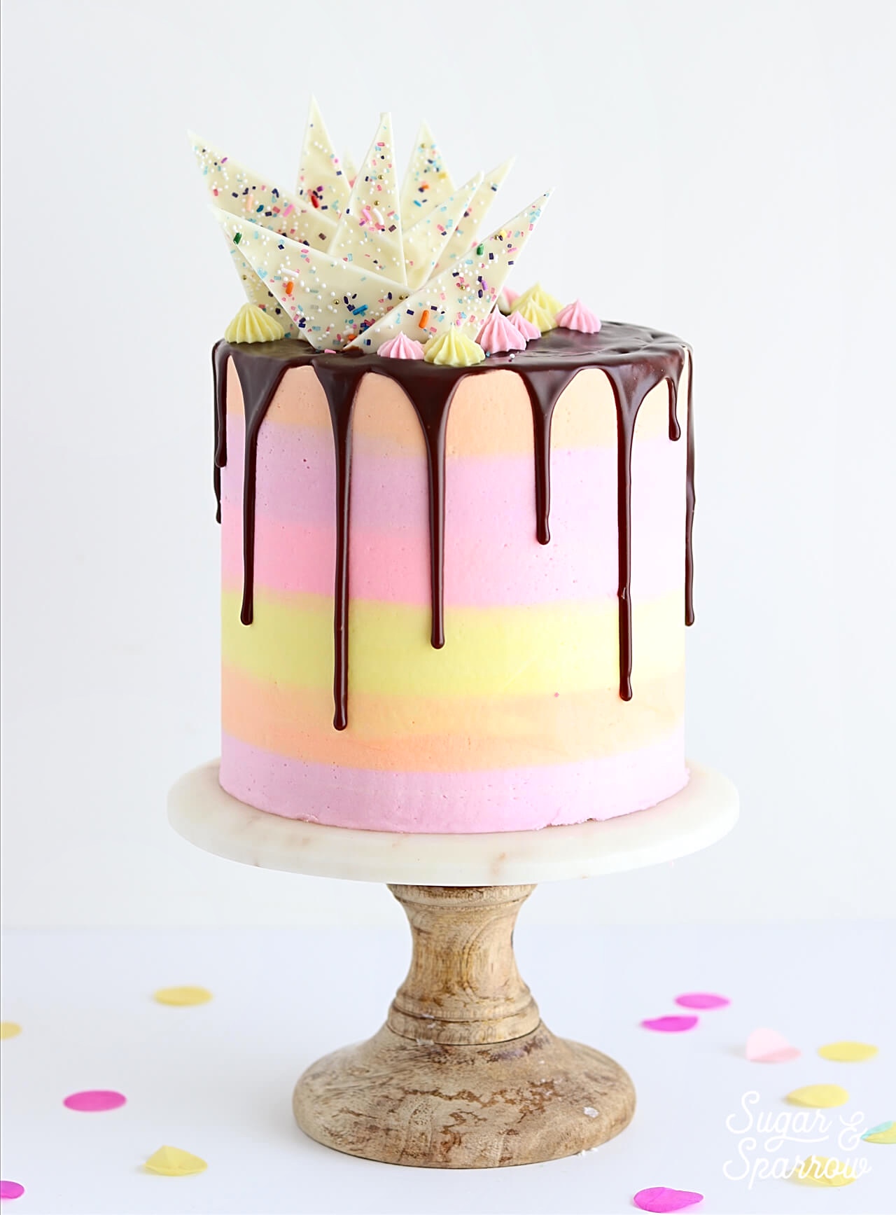 chocolate ganache drip cake by sugar and sparrow