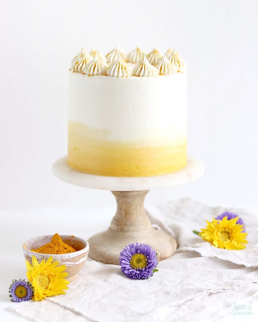 turmeric layer cake recipe with coconut buttercream by sugar and sparrow