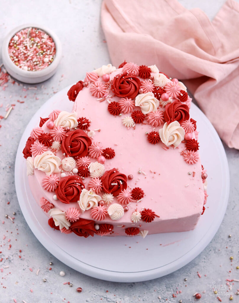 pink heart cake by sugar and sparrow