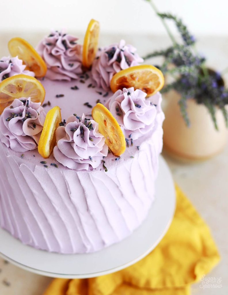 candied lemon slices on lemon lavender cake