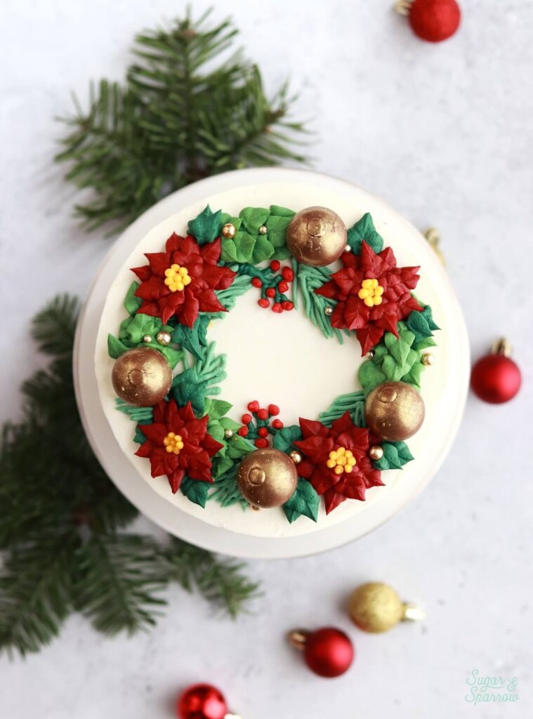 buttercream poinsettia wreath cake