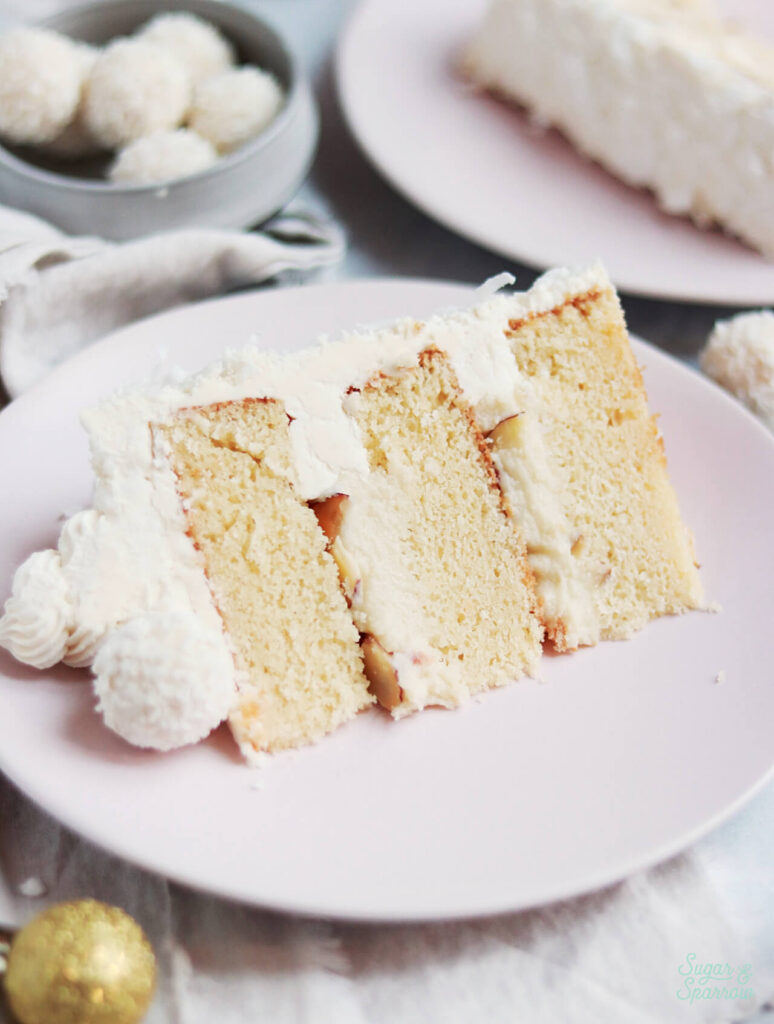 almond cake with coconut white chocolate frosting