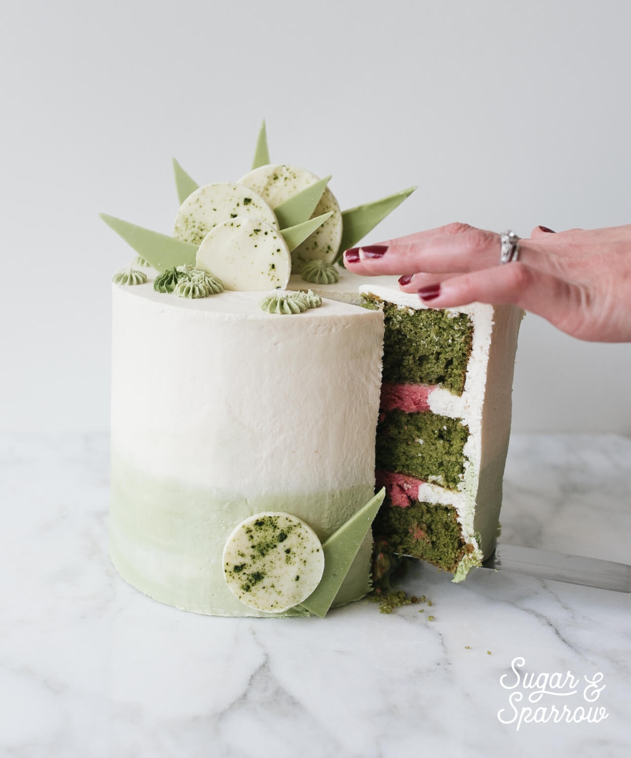 Matcha cake with raspberry buttercream by Sugar and Sparrow