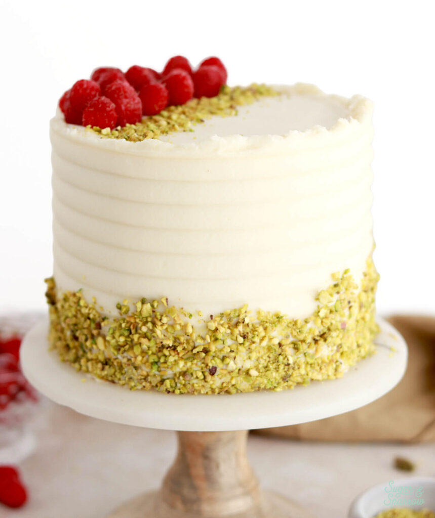 pistachio layer cake recipe with mascarpone frosting and raspberry filling