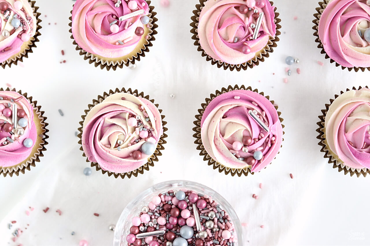 pink cupcakes with sprinkles