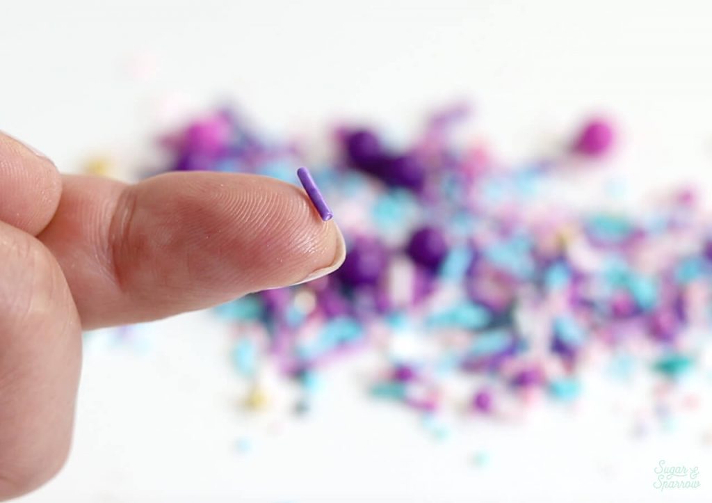 how to place sprinkles on cake by hand