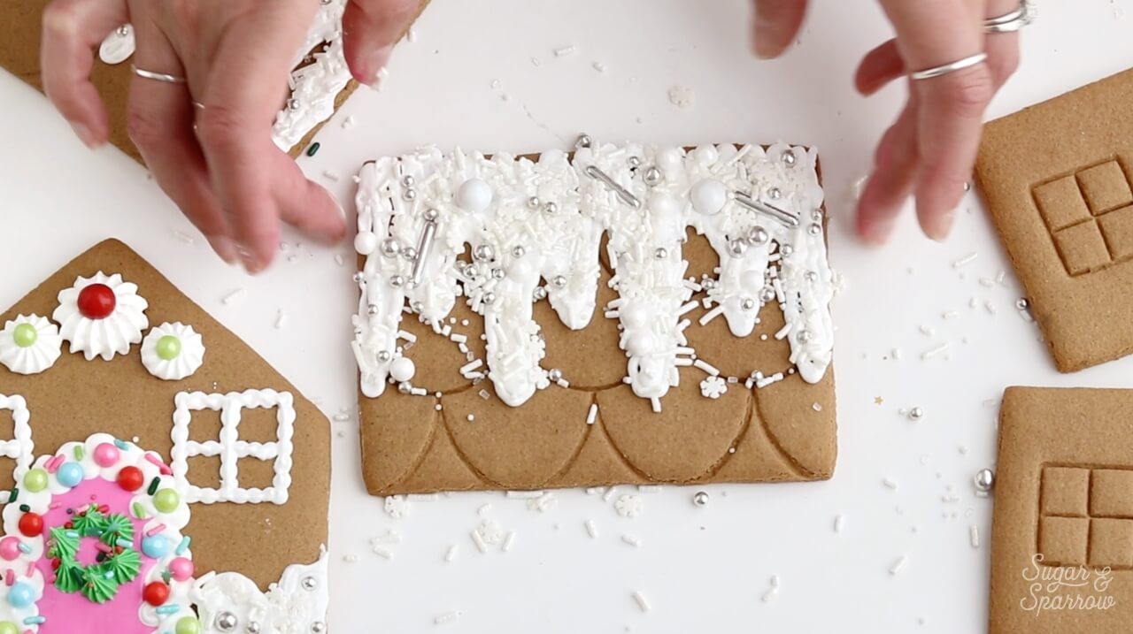 snow on gingerbread house