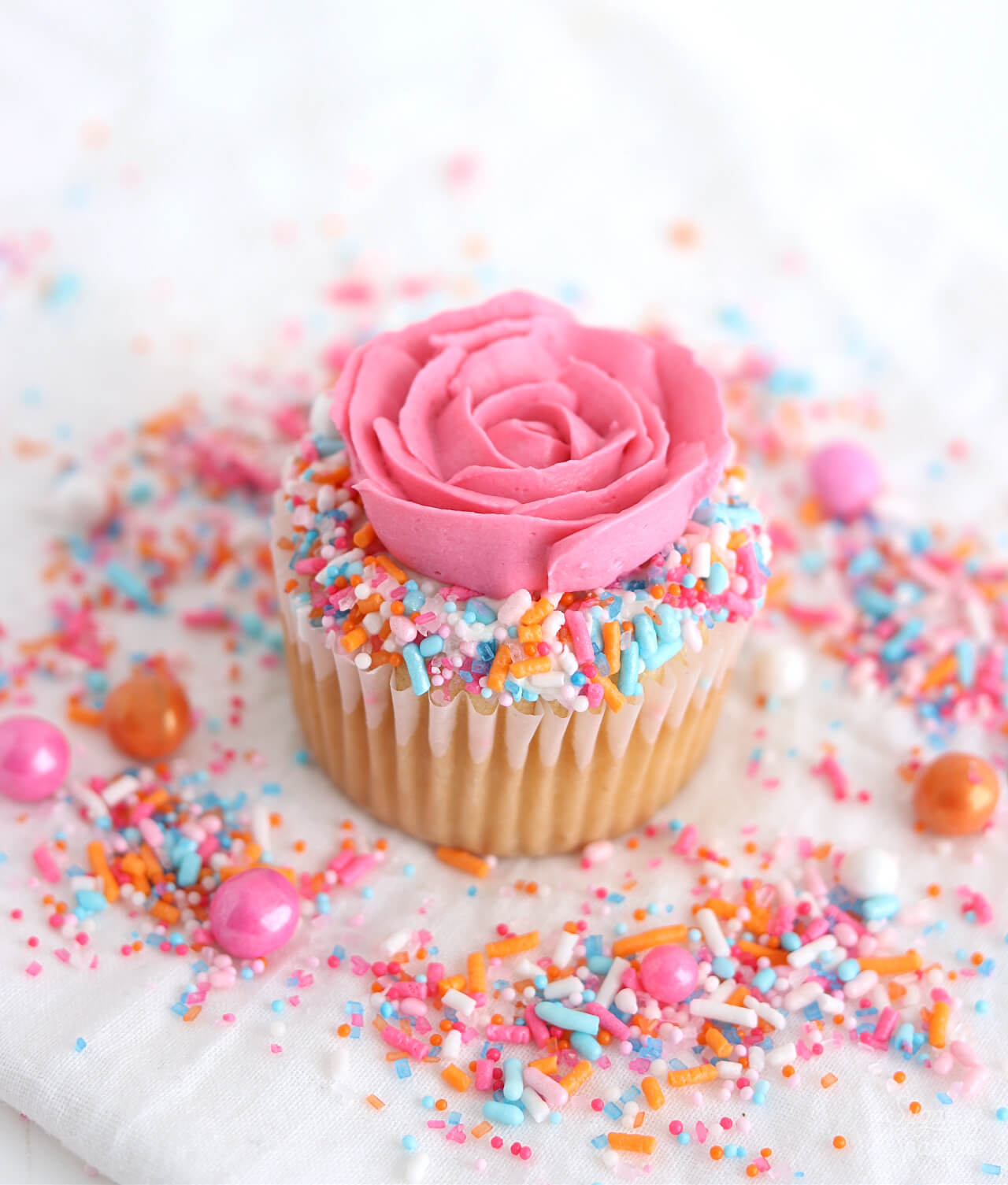 sprinkle rose cupcakes by sugar and sparrow