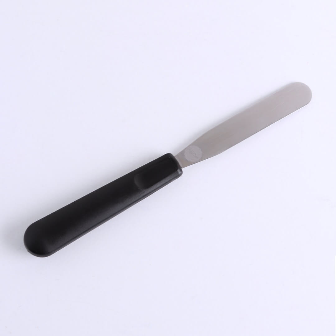 A 9-inch straight icing spatula sits on a white background.