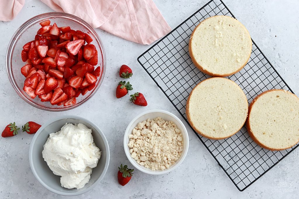 strawberry shortcake layer cake with whipped cream frosting