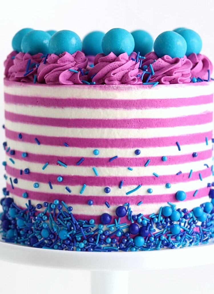 striped buttercream cake by sugar and sparrow