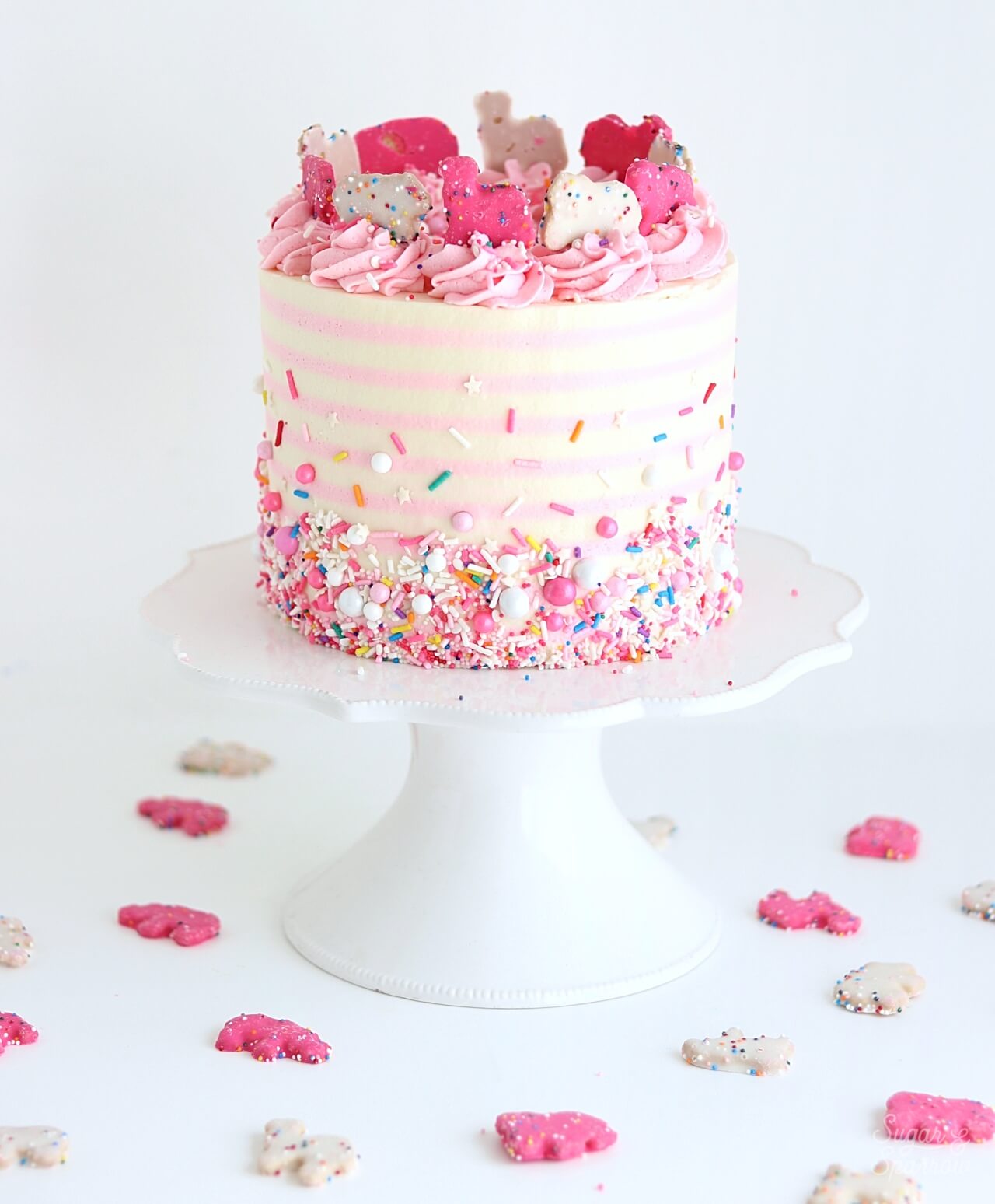 pink and white striped cak