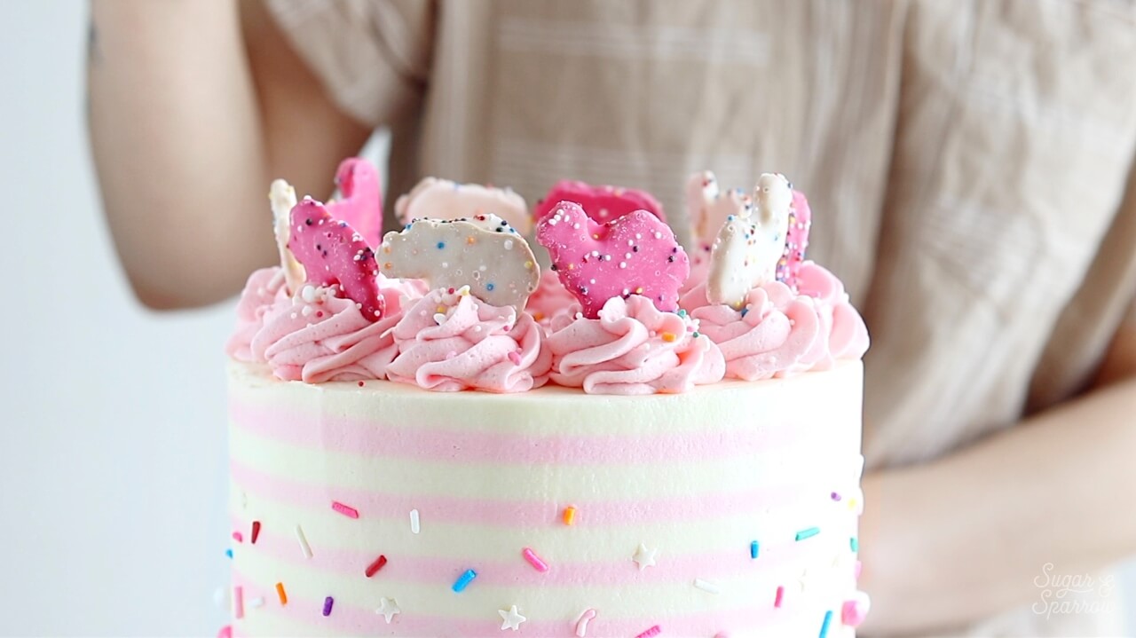 cake topped with circus animals