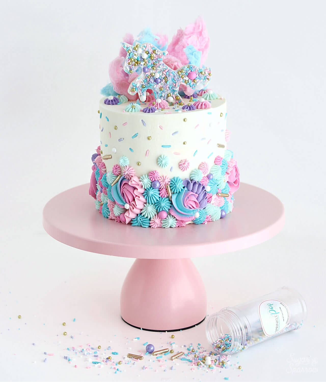 Unicorn cake with sprinkles and cotton candy