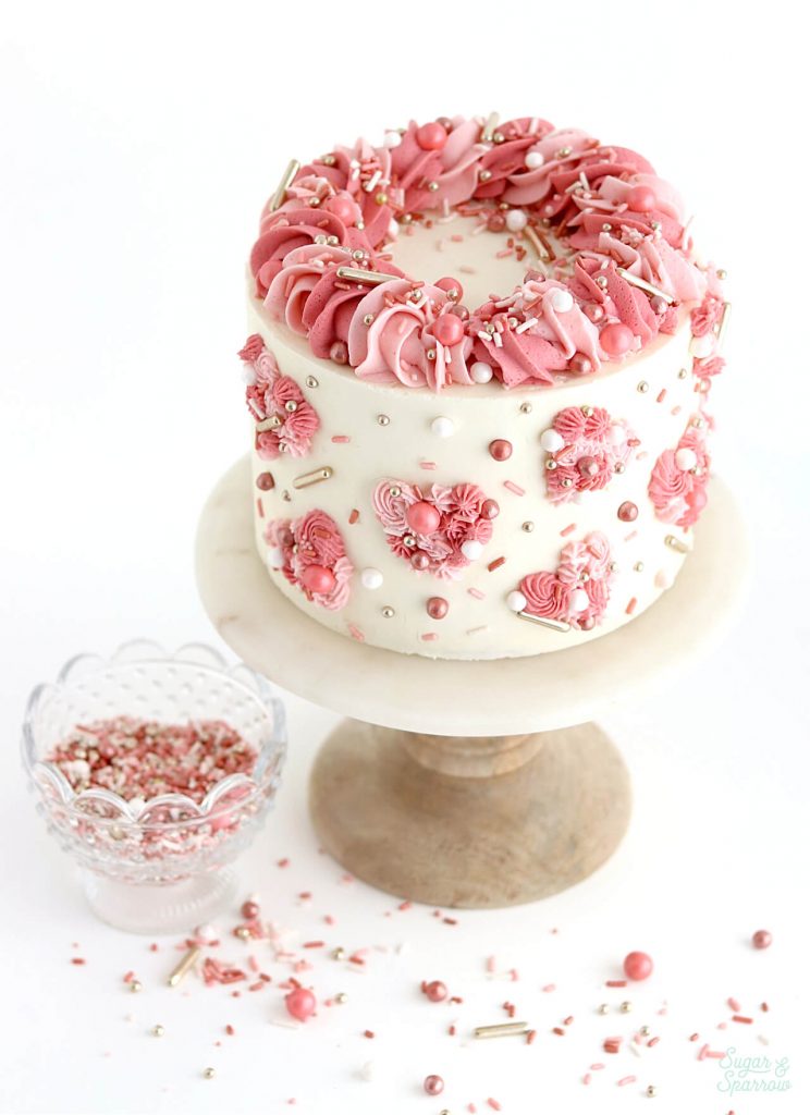 Pink valentines day cake with hearts