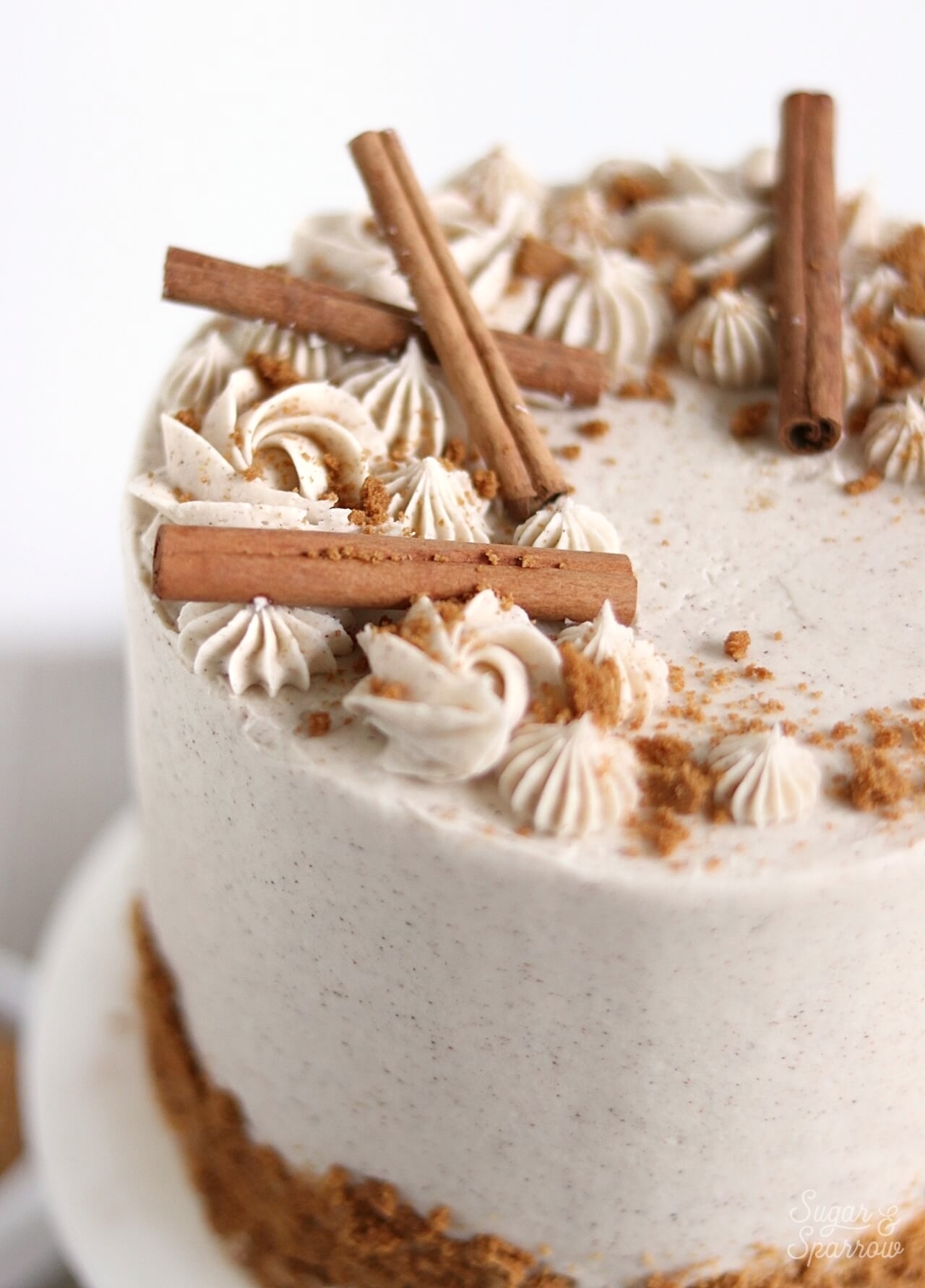 vanilla chai cake with cinnamon sticks and piped buttercream