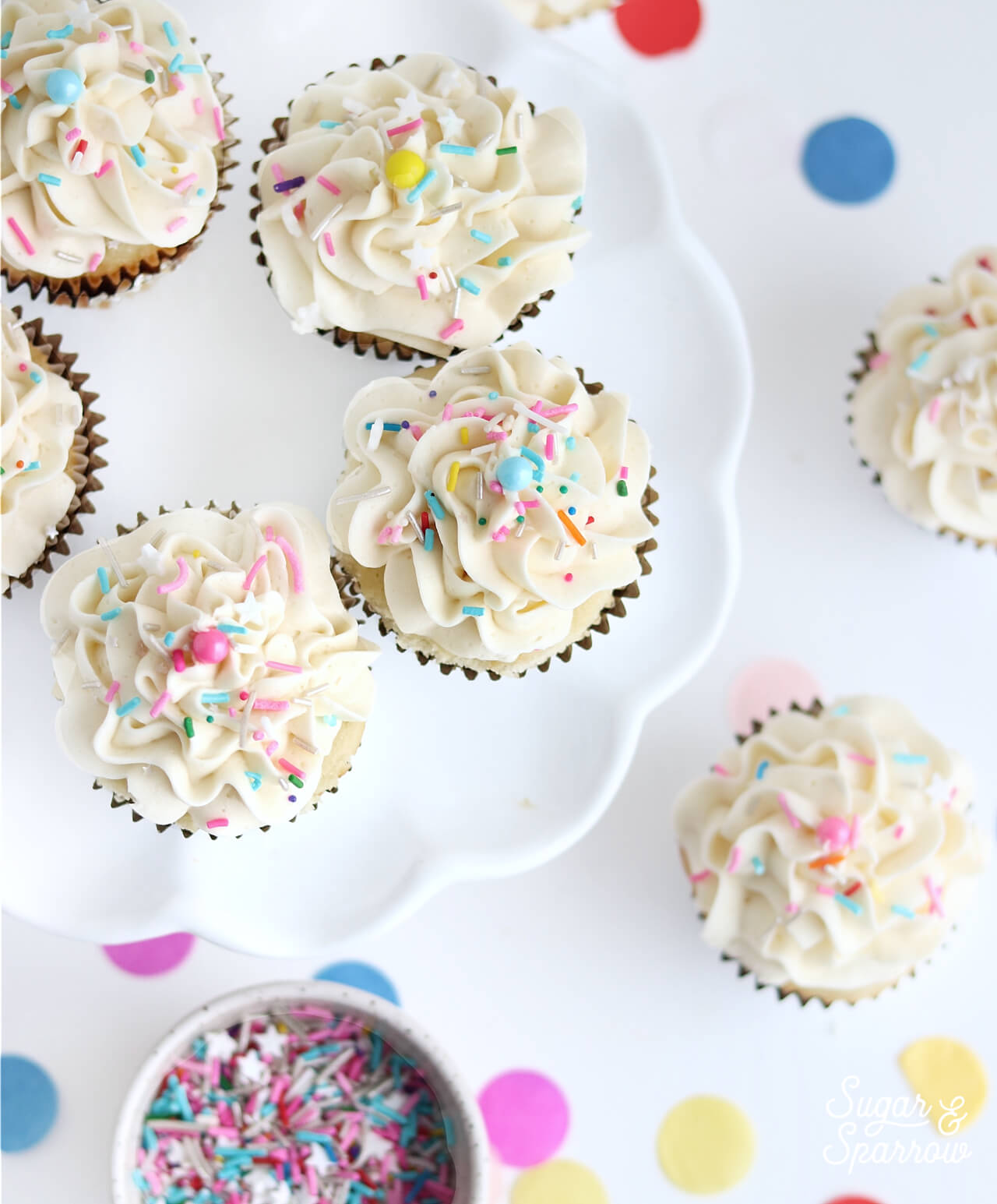 vanilla cupcakes with vanilla buttercream and sprinkles