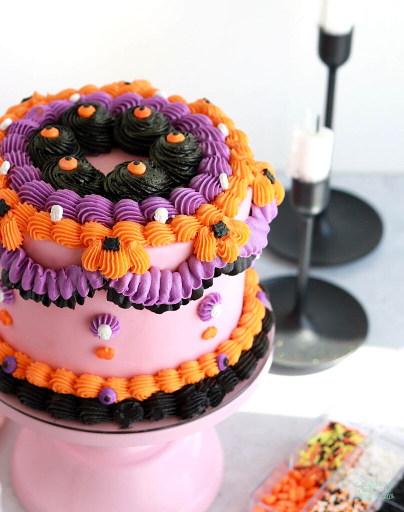 vintage pink halloween cake by sugar and sparrow