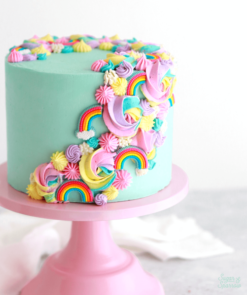 cascading rainbow cake by sugar and sparrow